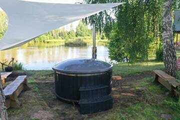 Фото номера Дом с 1 спальней Дома для отпуска Dragon house in the tree! Jacuzzi, Sauna , Apkure! г. Līči 72