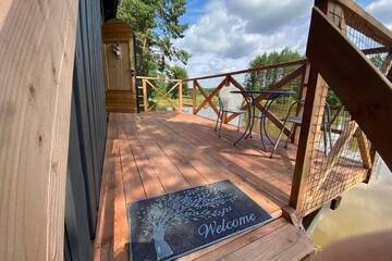 Фото номера Дом с 1 спальней Дома для отпуска Dragon house in the tree! Jacuzzi, Sauna , Apkure! г. Līči 80