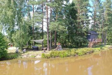 Фото номера Дом с 1 спальней Дома для отпуска Dragon house in the tree! Jacuzzi, Sauna , Apkure! г. Līči 55