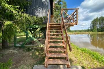 Фото номера Дом с 1 спальней Дома для отпуска Dragon house in the tree! Jacuzzi, Sauna , Apkure! г. Līči 60