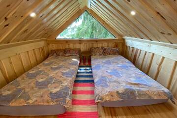 Фото номера Дом с 1 спальней Дома для отпуска Dragon house in the tree! Jacuzzi, Sauna , Apkure! г. Līči 24