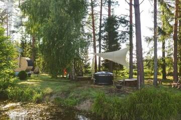 Фото номера Дом с 1 спальней Дома для отпуска Dragon house in the tree! Jacuzzi, Sauna , Apkure! г. Līči 66