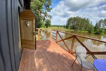 Фото номера Дом с 1 спальней Дома для отпуска Dragon house in the tree! Jacuzzi, Sauna , Apkure! г. Līči 69