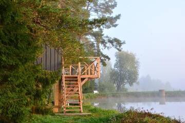 Фото номера Дом с 1 спальней Дома для отпуска Dragon house in the tree! Jacuzzi, Sauna , Apkure! г. Līči 93