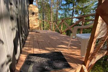 Фото номера Дом с 1 спальней Дома для отпуска Viking house in the tree! Jacuzzi, Sauna, Apkure! г. Līči 48