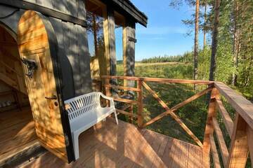 Фото номера Дом с 1 спальней Дома для отпуска Viking house in the tree! Jacuzzi, Sauna, Apkure! г. Līči 58